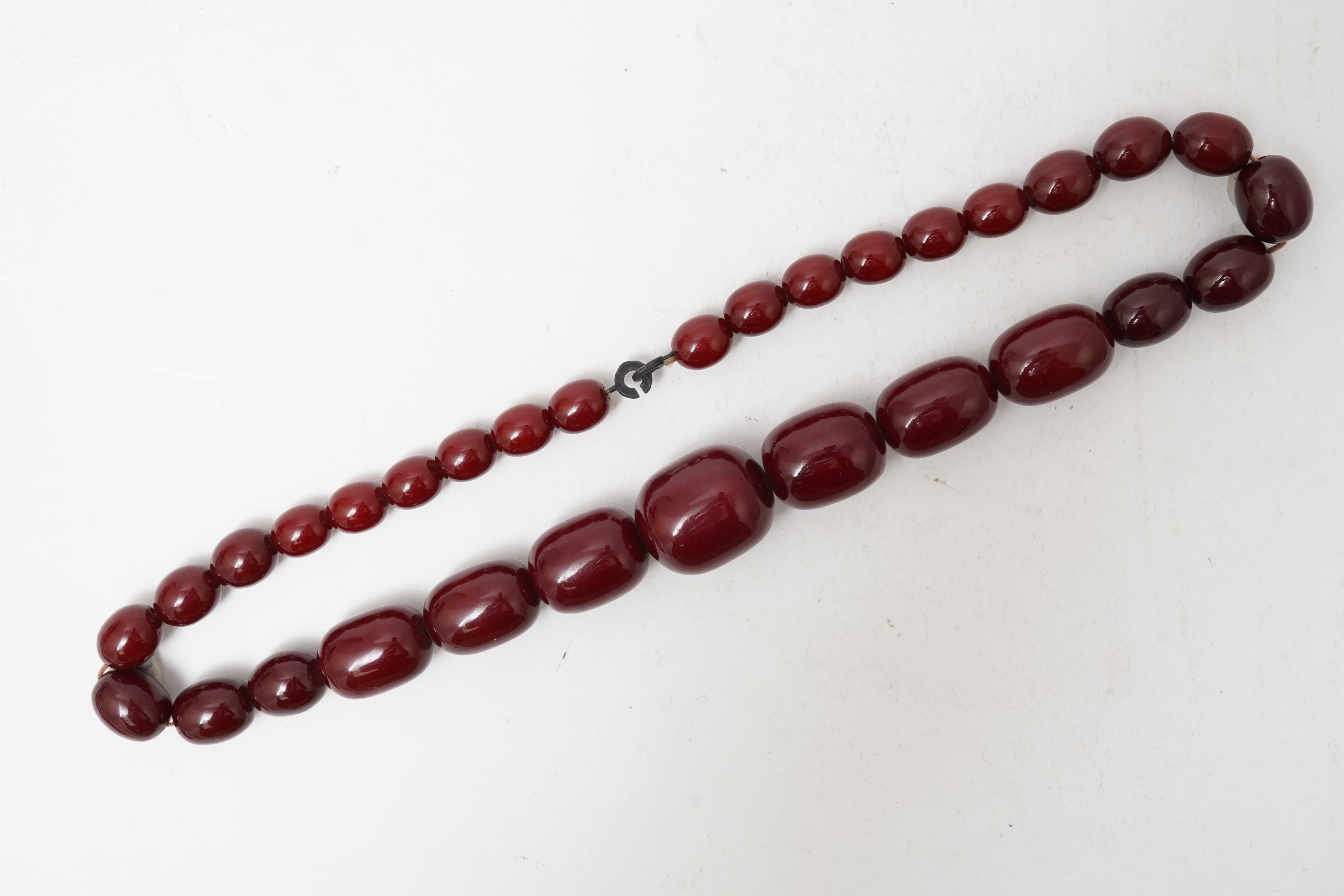 A cherry bakelite 'amber' necklace